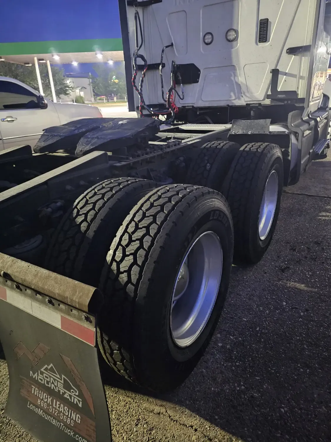 Freshly installed dual rear tires on semi-truck at a truck stop near Little Rock, Arkansas
